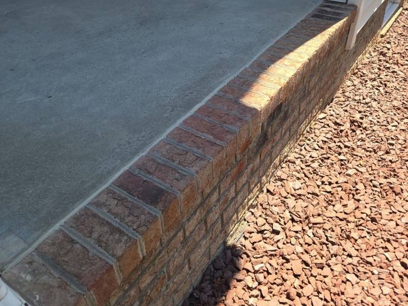image of caulked gap in rollock and porch filled in with caulk during repair from Stabil Solutions